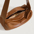 Interior view of tan Soft Leather Baguette Bag, great for everyday carry and travel.
