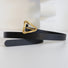 Front view of black Spiral Triangle Belt, stylish design for daily wear