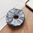 Angled view of Striped Layered Scrunchie in white and black, great for everyday styling and gifting.