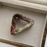 Angled view of triangle Tartan Elegance Hair Claw, easy for workdays and special occasions.
