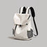 Off-white waterproof flap backpack displayed flat with black contrast straps.