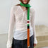 Model wearing colorblocked skinny polyester scarf in green, white, red, black, and orange, ideal for daily.