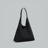 Classic black vintage suede hobo bag on a white background.