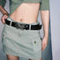 Model wearing black belt with silver metal butterfly buckle, high quality material for daily wear