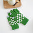 Green checkerboard knitted touch screen gloves with ribbed cuff; warm knit for outdoor winter use.