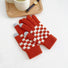 Red checkerboard knitted touch screen gloves with ribbed cuff; warm pattern gloves for winter texting.