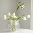 Clear acrylic fishtail flower vase, 7.9" tall, with white tulips and alstroemeria.