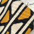 Detail view of Geometric Contrast Color Knitted Tote Bag, showcasing the knitted fabric.