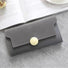 Angled view of Long Wallet With Nubuck Leather Flap in gray, easy for organizing cards and cash.