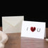 Angled view of Red Love Card, perfect for gifting.