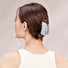 Model wearing Shell hair claw in blue crystal, easy for workdays and special occasions.
