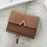 Close-up of Small Wallet With Nubuck Leather Flap in brown, great for everyday carry and travel.