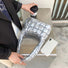 Angled view of Soft Leather Puffer Shoulder Bag in silver, easy for commuting and weekends.