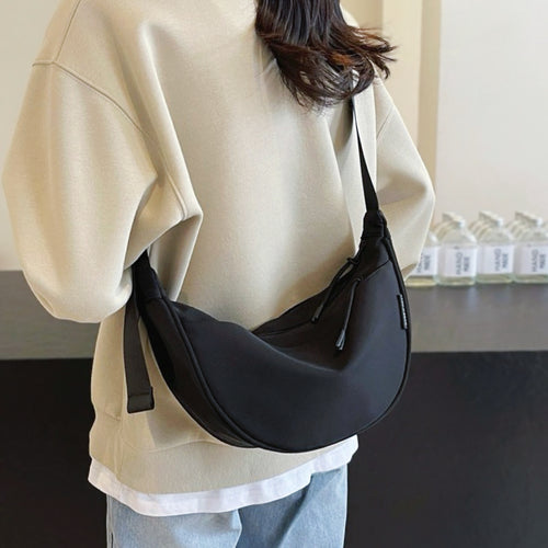 Bolso bandolera de media luna de doble cara