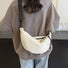 Bolso bandolera de media luna de doble cara