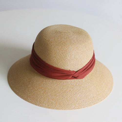 Sun protective foldable straw hat with ribbon