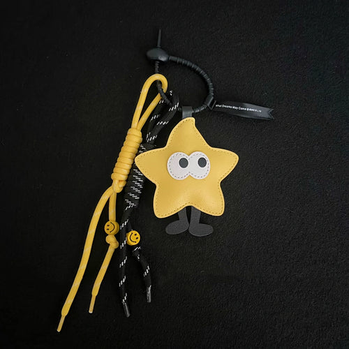 Taschenanhänger mit Sternen und großen Augen