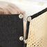 Detail view of the snap connection of bamboo storage basket.