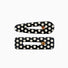 Two black acrylic hair clips with white polka dots, one oval and one rectangular.