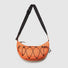 Front view of a bright orange airy nylon crescent sling bag, highlighting its technical fabric and minimalist lines.