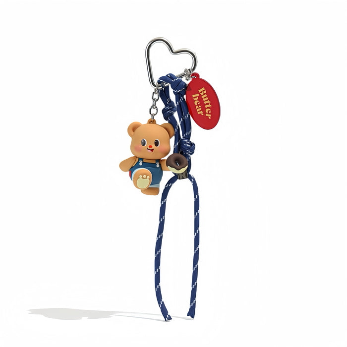 Cute Butter Bear bag charm with blue rope, heart-shaped alloy keyring, and red tag.