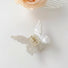 Angled view of butterfly hair claw in white, ideal for quick updos and ponytails.