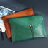 Two Buttoned Leather File Folder bags shown together,  easy for commuting and weekends.
