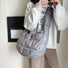 Bolso cruzado acolchado semicircular