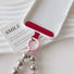 Detail view of the back side of Candy Bead Phone Charm, showcasing the connecting parts.