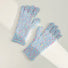 Blue candy-dot knit gloves with bobble dot texture and ribbed cuffs; soft knit for winter walks.