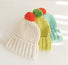 Front view of white Candy Knitted Pompom Beanie. Playful 3D pompom on soft polyester-cotton.
