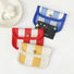 Canvas coin purses in blue gingham, red stripe and yellow gingham; snap-flap holders for cards and change.