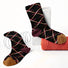 Front view of Black cotton-polyester socks with caramel and burgundy diamond pattern, one size Caramel Diamond Socks.