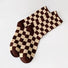 Angled view of Checkerboard Colored Socks in brown, great for daily wear and lounging.