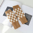 Tan checkered fingerless gloves; versatile earth-tone accessory, ideal as a warm winter birthday gift.