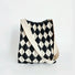 Minimalist black and beige argyle knitted shoulder bag, an open-top bag for daily use.