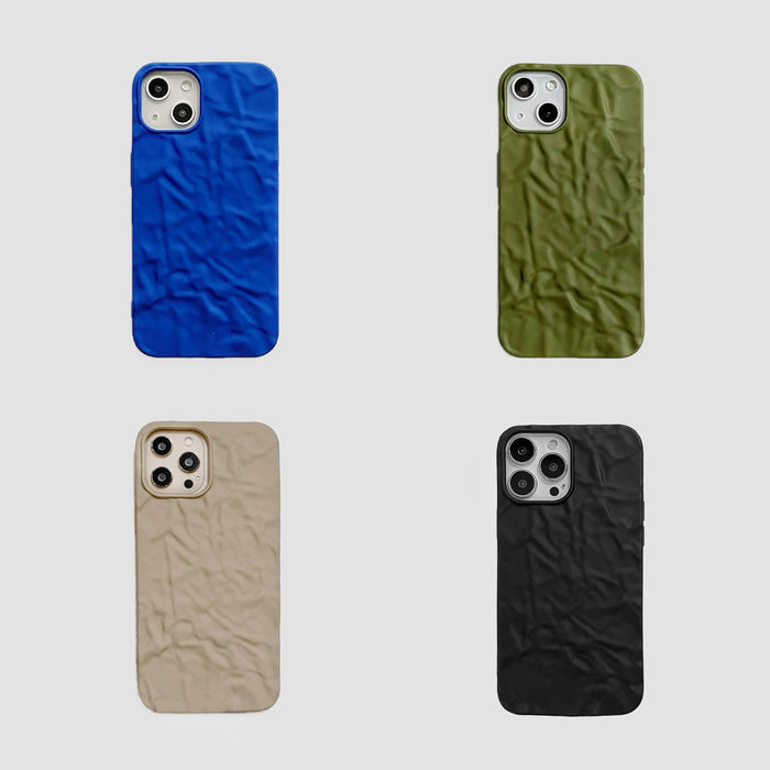 Four silicone pleated iPhone cases in blue, olive green, beige, and black.