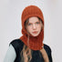 Rust orange balaclava hat crafted from premium 20% wool blend, featuring a soft ribbed texture.