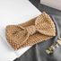 Folded view of Crochect Bow Headband in khaki, ideal for quick updos and ponytails.