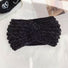 Flat lay of Crochet Velvet Twist Headband in black, great for everyday styling and gifting.