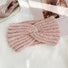 Folded view of Crochet Velvet Twist Headband in pink, ideal for quick updos and ponytails.