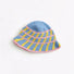 Detailed top view of the blue bucket hat, with pink and yellow cross striped pattern.