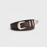 Close-up view of the brown leather belt showing the vintage silver pointed buckle and double keeper loops.