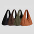 Collection of ease suede hobo bags in four earthy neutral shades.