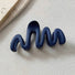 Close-up of Elegant Wave Hair Claw in blue, ideal for quick updos and ponytails.