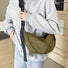 Bolso bandolera de media luna de doble cara