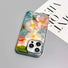 White and pink flowers floating on blue-green water design silicone case. Submerged botanical art.