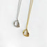 Front view of Fluid Shaped Pendant Necklaces in gold and silver , great for everyday outfits.