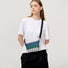 Front view of model with the FREEIN bag, highlighting the adjustable strap length and comfortable carry.