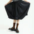 Model wearing a pair of Fuzzy Check Textured Socks in brown, easy to pack for travel and errands.